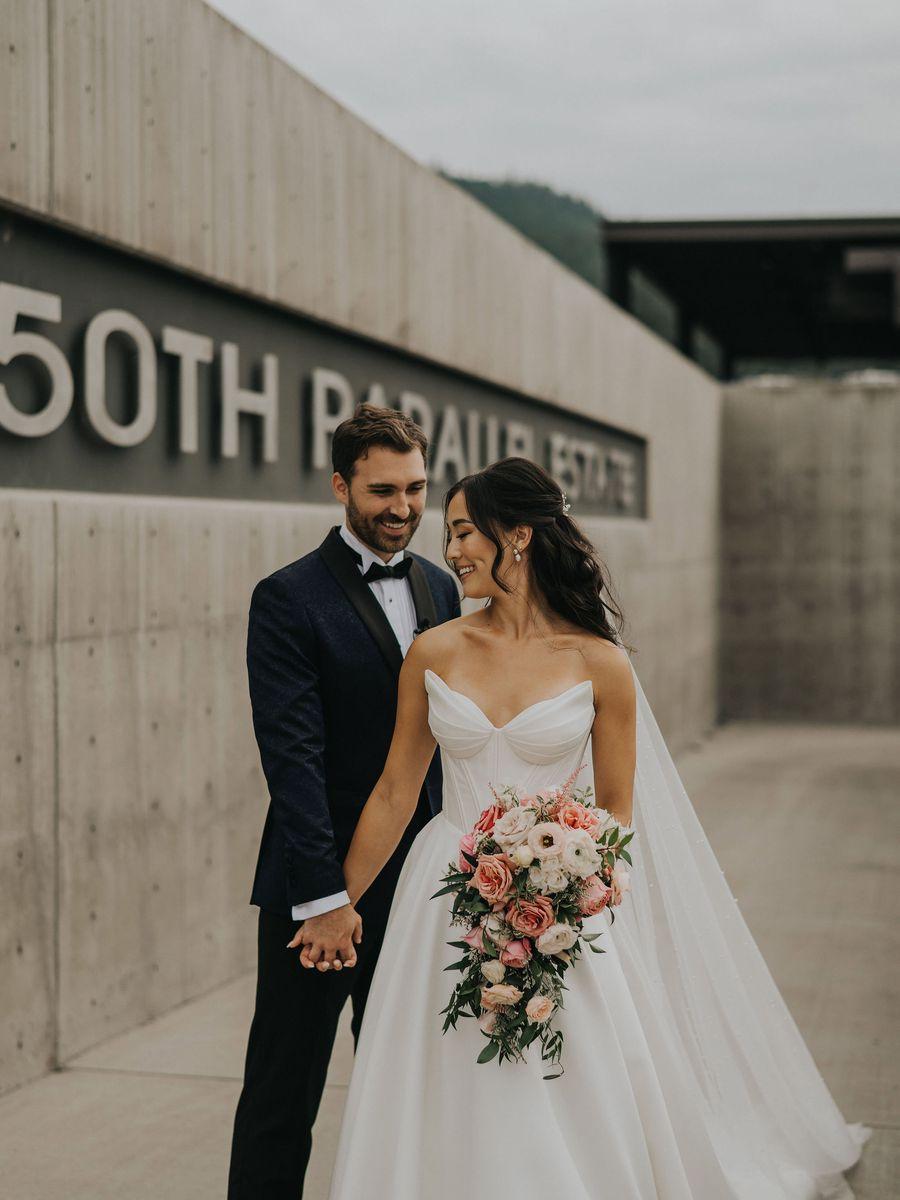 Bride and groom with wedding bouquet